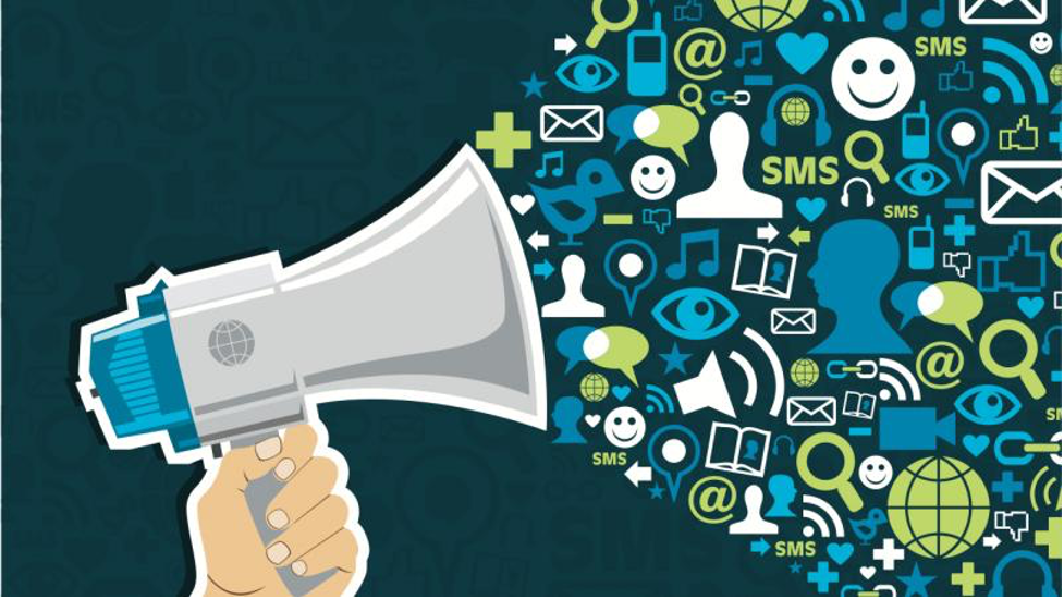 a hand holding a megaphone with social media icons 